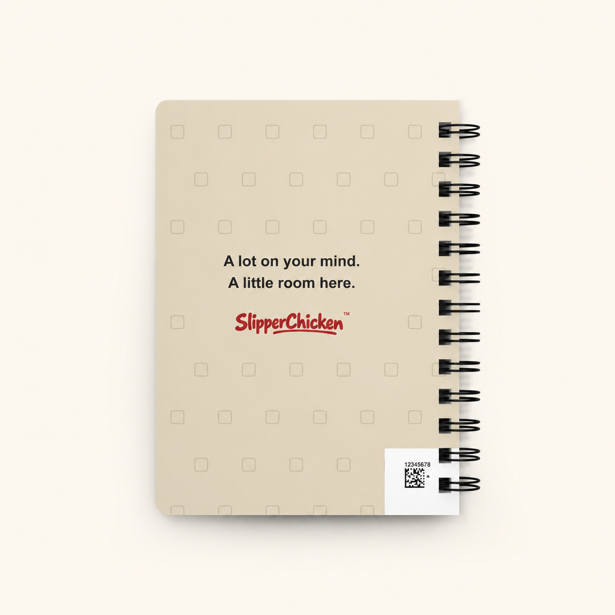 Overwhelmed Journal warm-sand back with subtle checkbox pattern, A lot on your mind. A little room here., SlipperChicken wordmark and visible production barcode, on site tan.