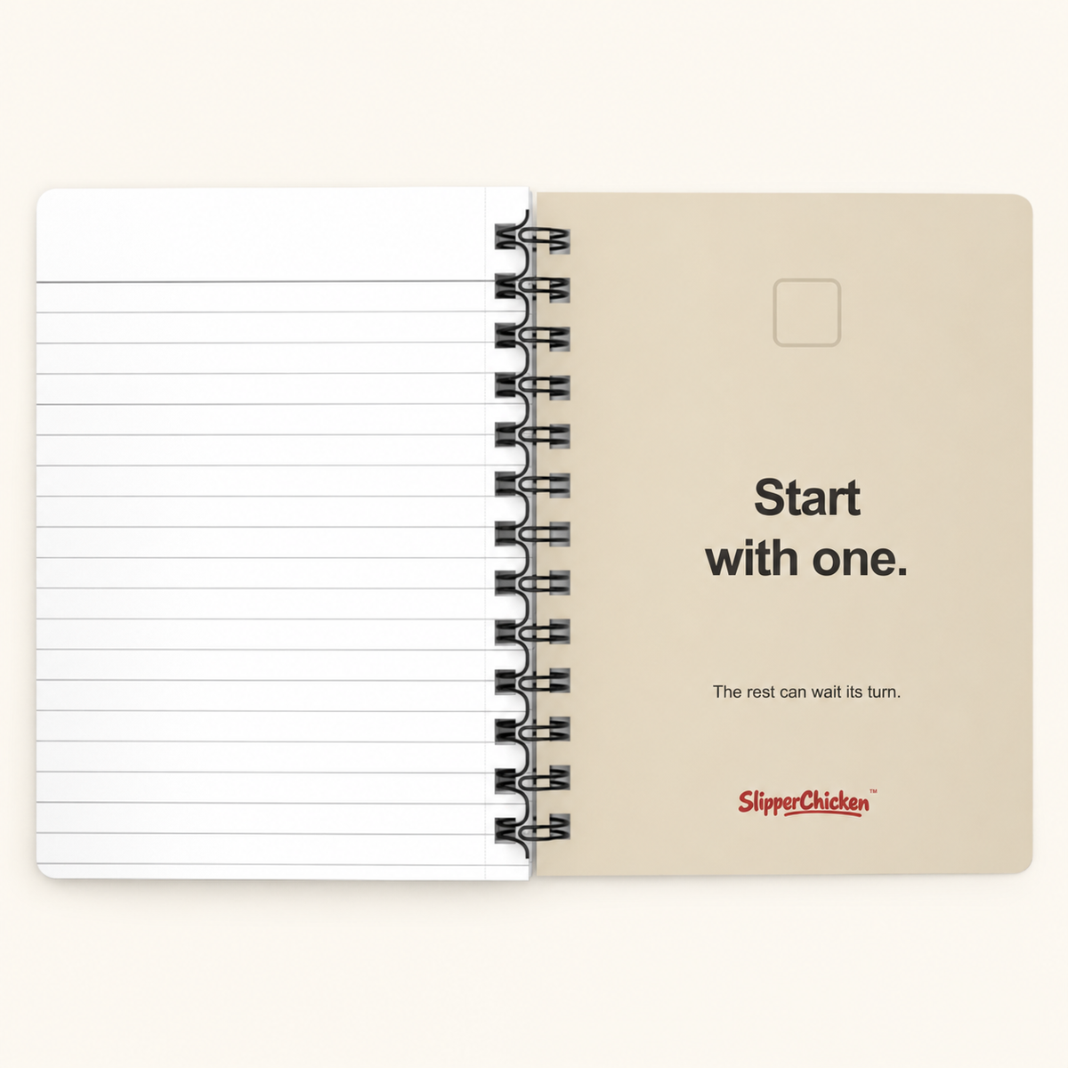 Overwhelmed Journal warm-sand Start with one. inside-back cover beside white lined pages, on site tan.