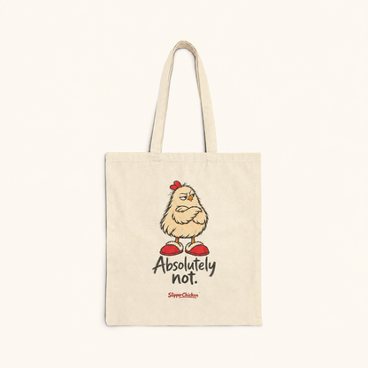 Natural canvas Unimpressed Tote with crossed-wing chicken, Absolutely not. in two lines and discreet red SlipperChicken signature, on site tan at actual supplier print proportions.