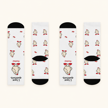 All sides of Curious Socks on a warm tan studio background