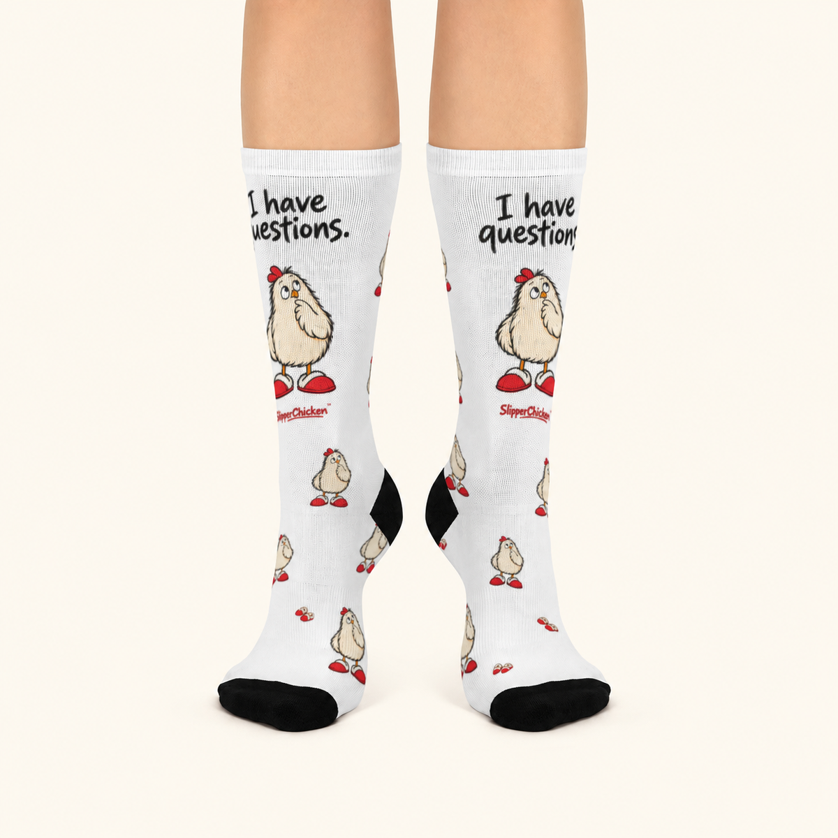 Curious Socks pair on a warm tan studio background