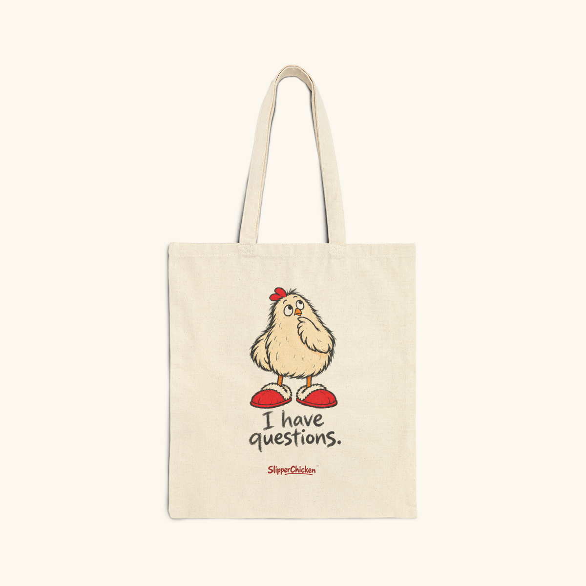 Natural Curious Tote with the I have questions. chicken design, shown at supplier print proportions on the site tan background.