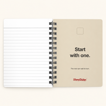 Overwhelmed Journal warm-sand Start with one. inside-back cover beside white lined pages, on site tan.