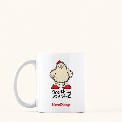 Overwhelmed Mug with handle on the left, preserving Printed Mint's saved artwork scale and placement on a warm tan background.