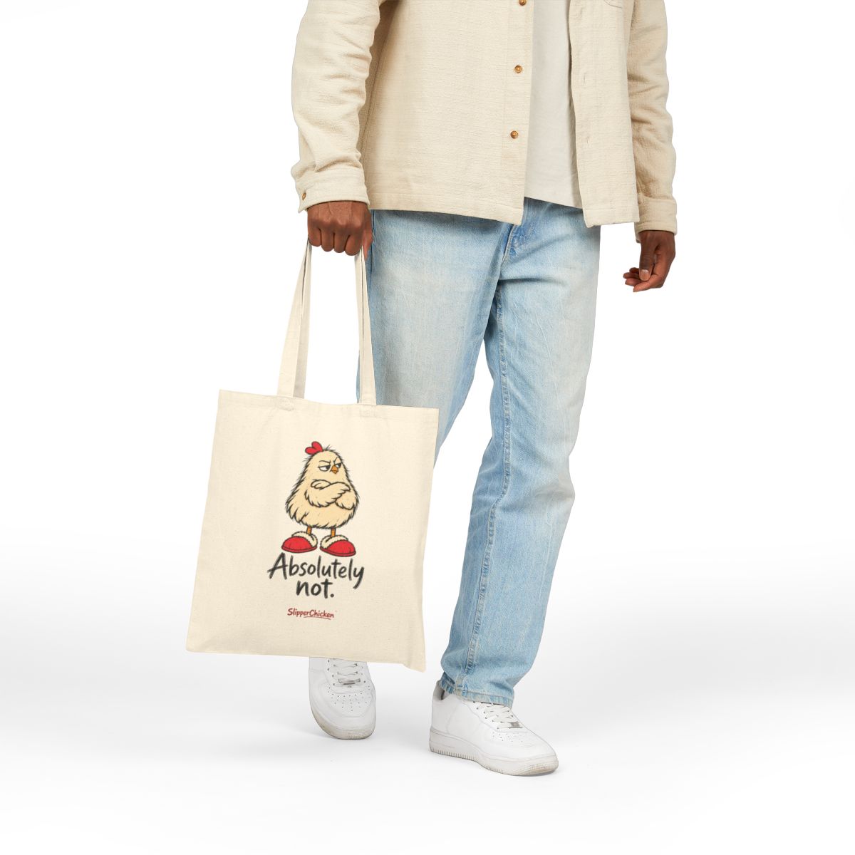 Native Printify mockup of the natural 15 × 16-inch Unimpressed Tote carried by hand, showing Absolutely not. at the saved print proportions.